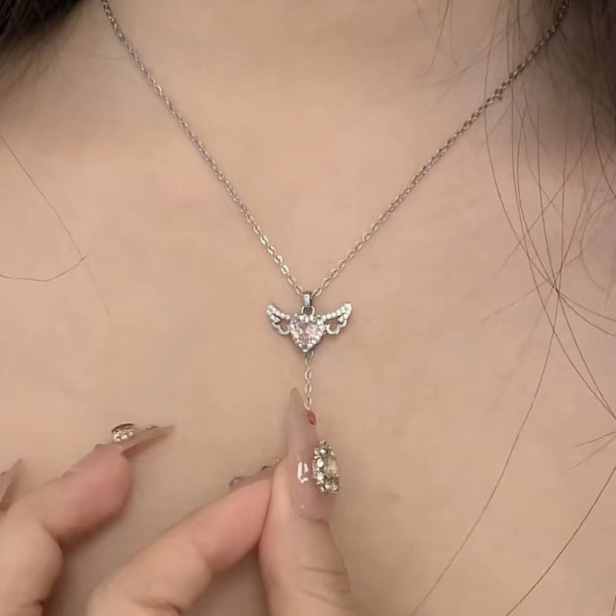Collana ali di angelo con cuore