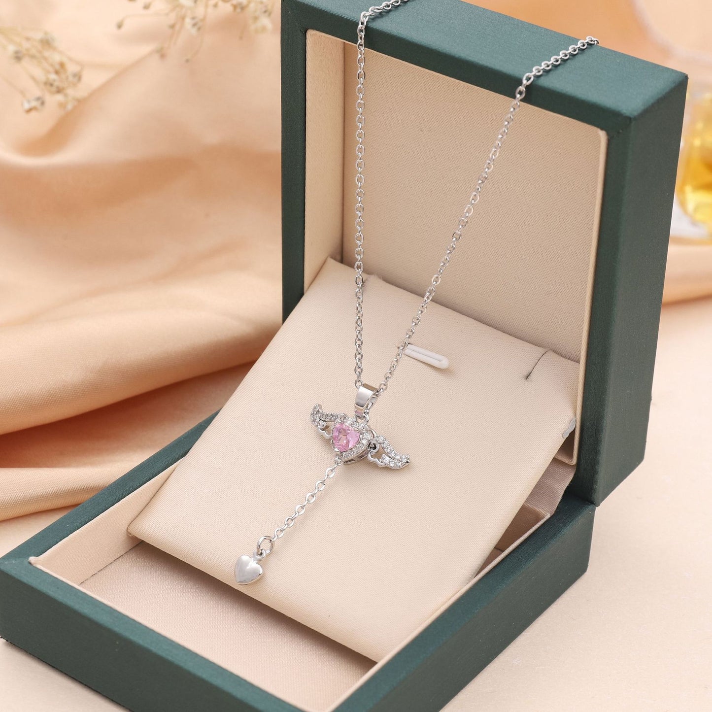 Collana ali di angelo con cuore